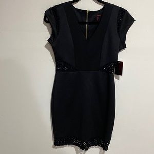 BODY CON BLACK DRESS WITH CIRCULARS CUT OUTS